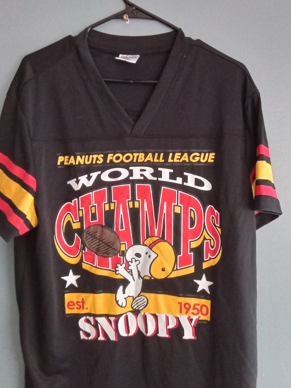 Peanuts Black Graphic Tee with Red and Yellow Accents